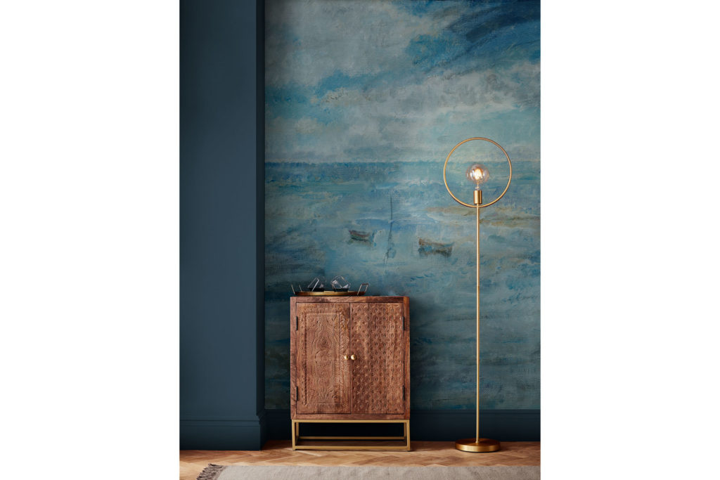 Walker Seascape Bespoke Mural with a lamp and wooden bedside table out in front
