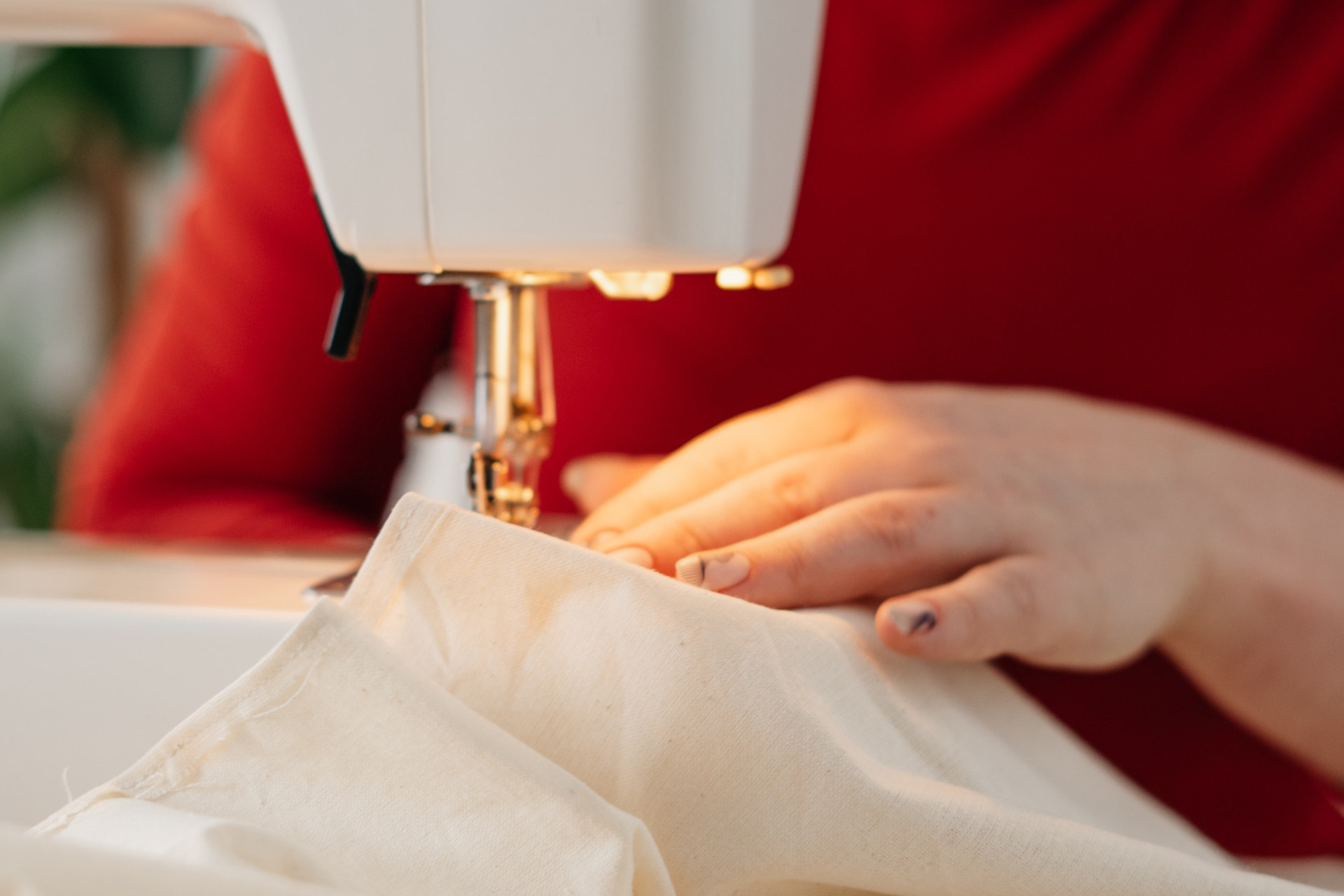 Someone using a sewing machine