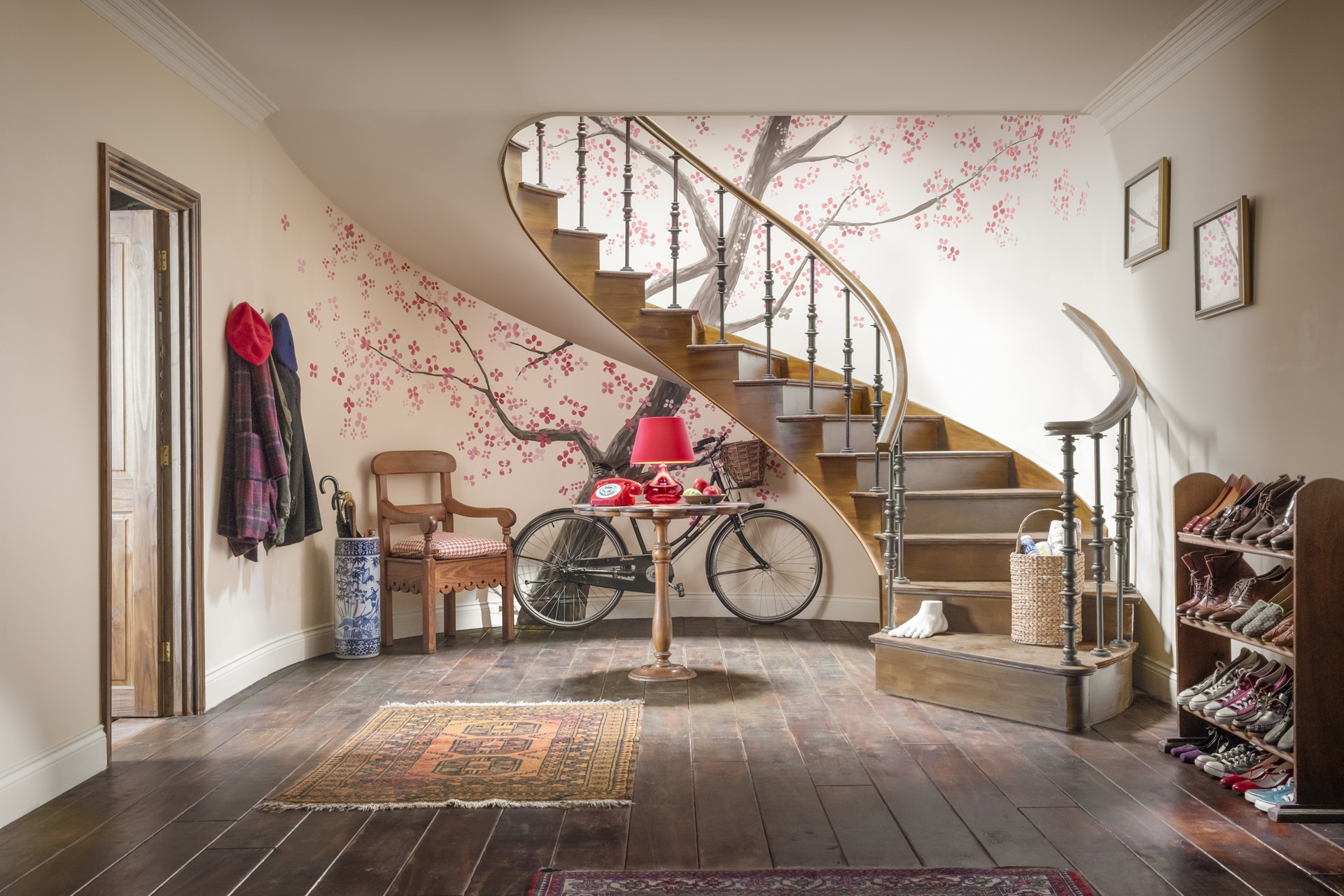 The foyer with a bike and shoe rack