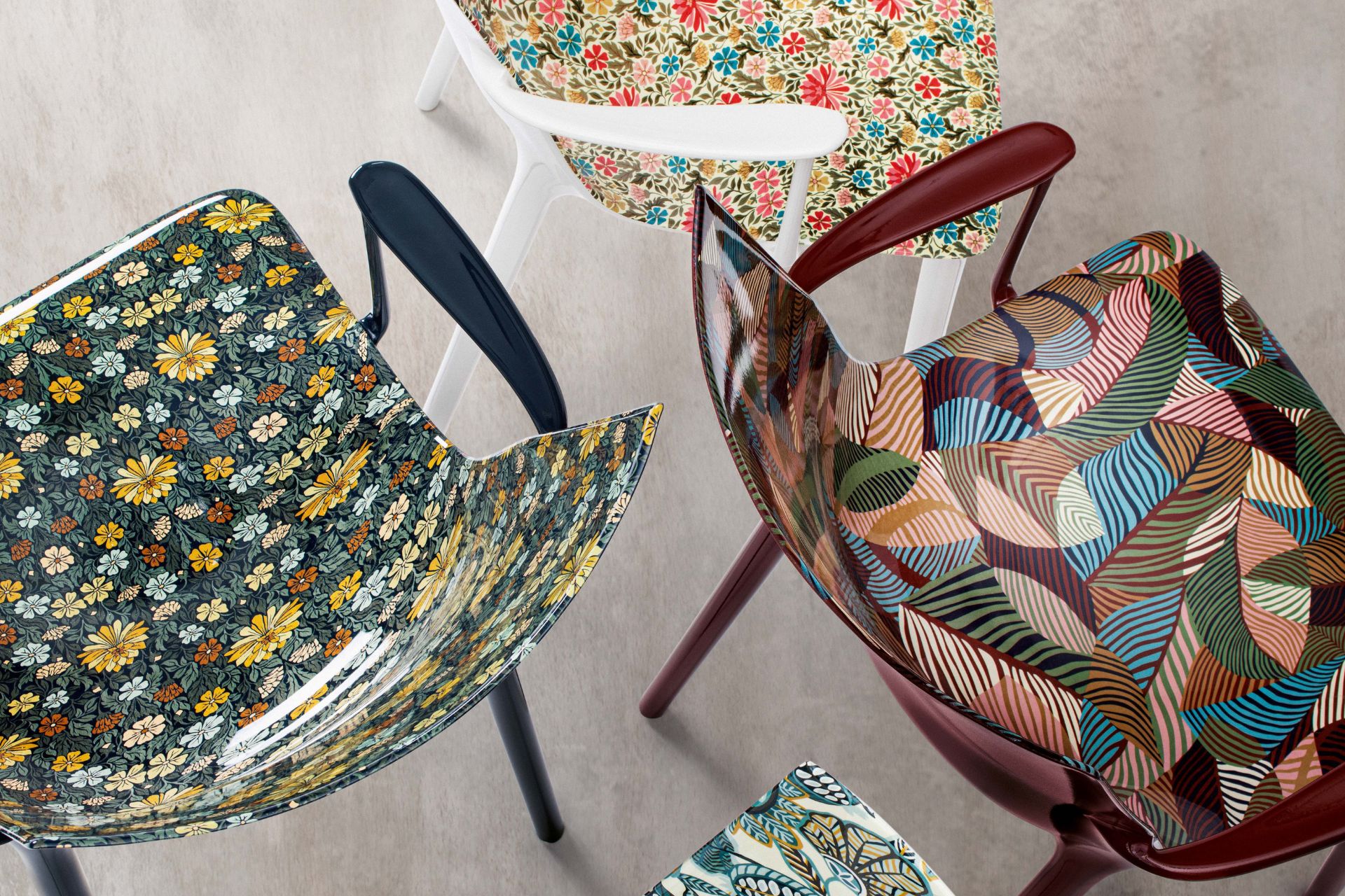 Slim polycarbonate armchairs in signature Liberty prints